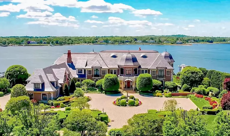 Luxury waterfront home with landscaped garden overlooking a river in Monmouth County
